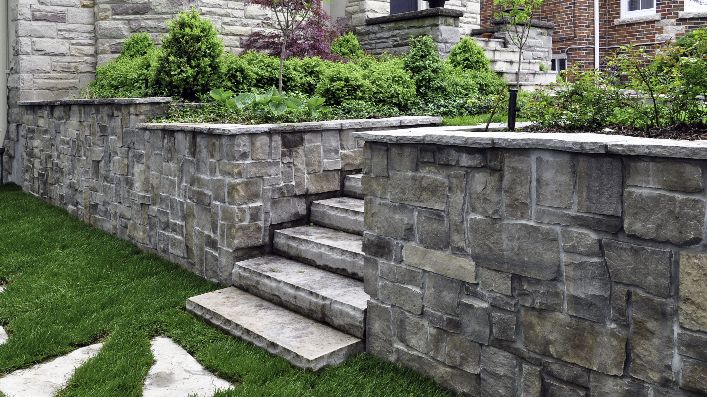 A stain and stone brick retaining wall.