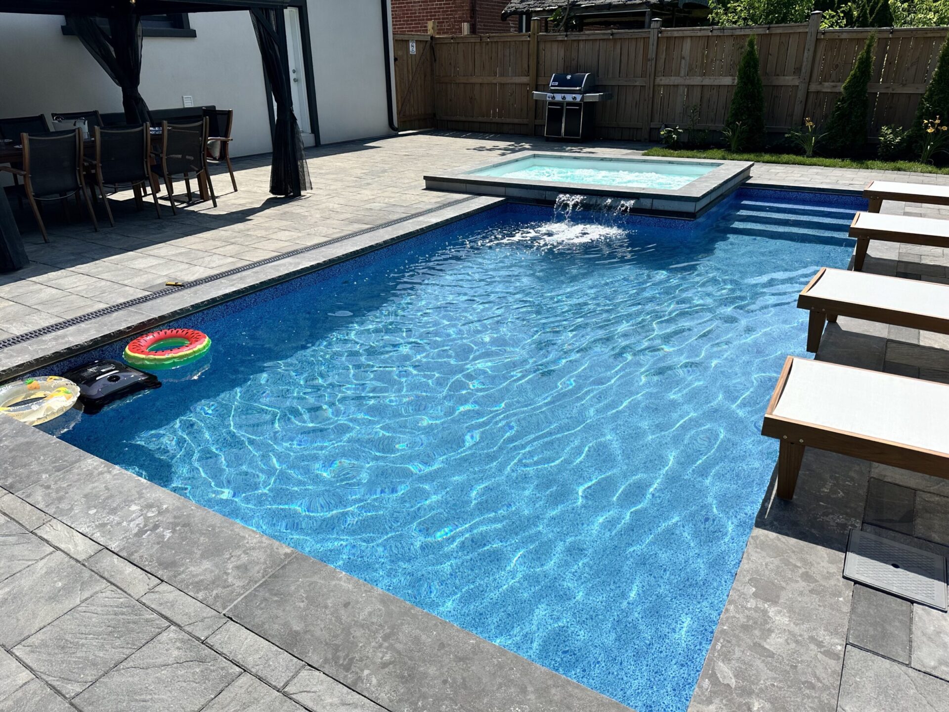 water feature and a pool